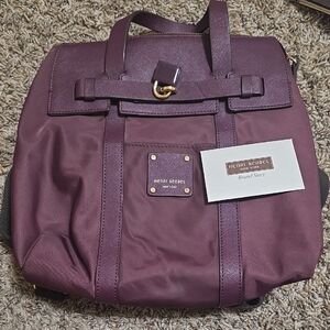 Henri Bendel Burgundy Mini Jetsetter Backpack.